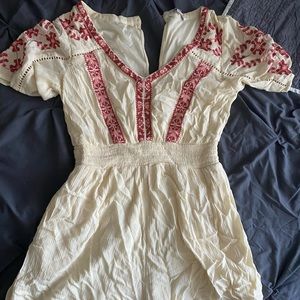 red floral and cream romper